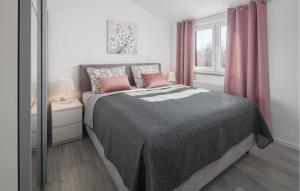 Katil atau katil-katil dalam bilik di 2 Bedroom Lovely Apartment In Nova Vas