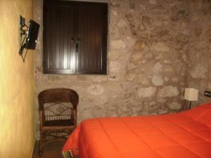 Ліжко або ліжка в номері Torre Del Inquisidor