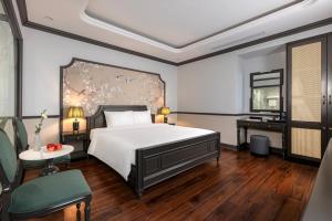 Postel nebo postele na pokoji v ubytování Sapa Soleil Hotel + 37 fotografií