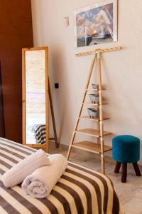 Posteľ alebo postele v izbe v ubytovaní Lenico Beachfront Suites