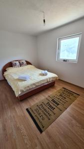Postel nebo postele na pokoji v ubytování Apartment Buk