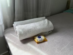 Postel nebo postele na pokoji v ubytování Suítes e quartos no Centro de Blumenau
