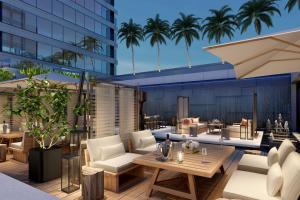 an architectural rendering of a rooftop patio with tables and chairs at JW Marriott Hotel Nairobi in Nairobi