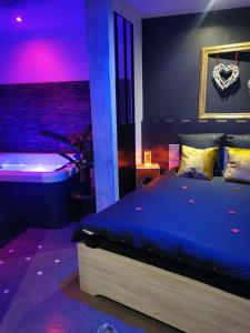 a bedroom with a bed and a bath tub at Cocoon d'Allauch in Allauch
