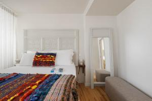 Postel nebo postele na pokoji v ubytování Story Studio Coimbra Centro - Culture