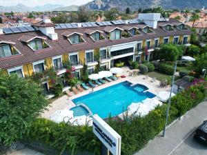 an aerial view of a hotel with a swimming pool at Michelangelo Boutique Hotel Dalyan in Dalyan