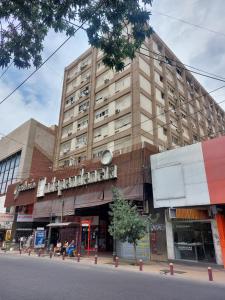 a large building on the side of a street at Alojamiento cómodo en el centro in Mendoza