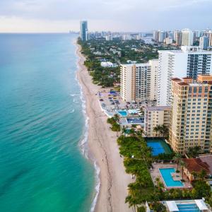 an aerial view of the beach and buildings at Walk to the beach, Studio, with Pool and FREE Parking in Hallandale Beach