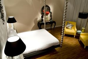 Кровать или кровати в номере Abalú Small Luxury & Design Boutique Hotel