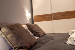 Letto o letti in una camera di Alipa Suite with Jacuzzi
