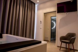 TV o dispositivi per l'intrattenimento presso Alipa Suite with Jacuzzi