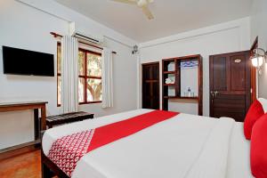 Posteľ alebo postele v izbe v ubytovaní Flagship Cherai Panoramic Beach Hotel
