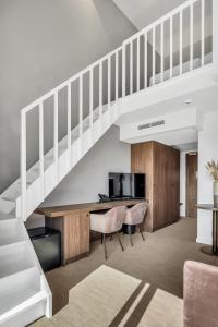 TV a/nebo společenská místnost v ubytování Dune Hotel Nieuwpoort