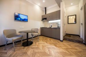 Kuchyň nebo kuchyňský kout v ubytování Self Check-in Apartments Maidan Area