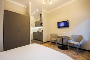 Kuchyň nebo kuchyňský kout v ubytování Self Check-in Apartments Maidan Area