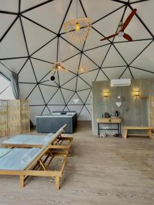 a large room with a ceiling with black at Montimerso Skyscape Countryhouse in Monsaraz