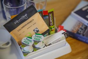 a packet of food sitting on top of a table at The Buttery in Oxford