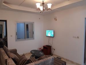 TV a/nebo společenská místnost v ubytování Studio confortable moins cher