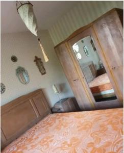 Ένα ή περισσότερα κρεβάτια σε δωμάτιο στο Duplex, piano, billard, ping-pong, jardin, jacuzzi en été