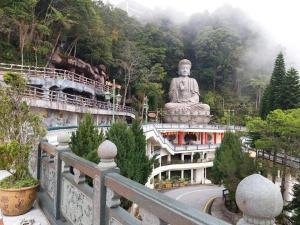 a large statue sitting on top of a building at The Artz Hotel in Genting Highlands