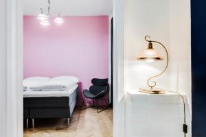 Postel nebo postele na pokoji v ubytování Curiosity apartments + 58 fotografií