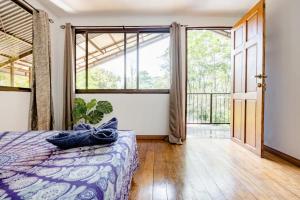 Un pat sau paturi într-o cameră la Casa Patricia