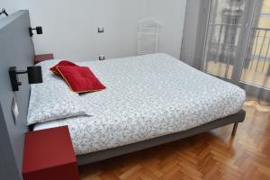 Posteľ alebo postele v izbe v ubytovaní Appartamenti Bruzzanese