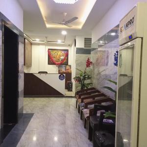 Lobby alebo recepcia v ubytovaní Hotel Lakshya Sheesh Mahal Indore