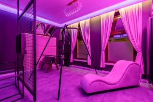 Łóżko lub łóżka w pokoju w obiekcie Secret Love BDSM