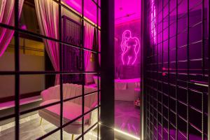 Łóżko lub łóżka w pokoju w obiekcie Secret Love BDSM