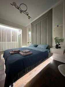 Gulta vai gultas numurā naktsmītnē Luxury two-room apartment with beautiful mountain views