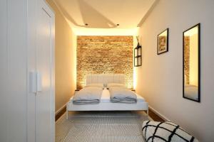 Ένα ή περισσότερα κρεβάτια σε δωμάτιο στο Central Apartment - Linienstraße
