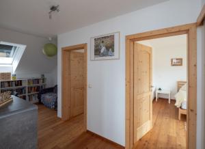 an open door in a room with a bedroom at Ferienhaus Jordi & Lara by Appartementhaus Theresia in Bad Mitterndorf