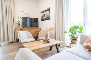 Un televizor și/sau centru de divertisment la Residenz - Haus Luft - Penthouse - Sauna - Parkplatz