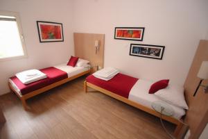 Postel nebo postele na pokoji v ubytování Villa Deny Mostar - with free parking