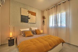 Voodi või voodid majutusasutuse Appartement TalyJay toas