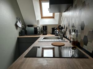 Køkken eller tekøkken på Studio Le Mat vue Mer