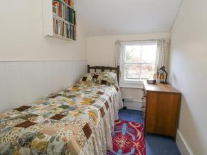 Voodi või voodid majutusasutuse Chenies toas