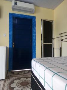 Apartamentos no Farol Velho 객실 침대
