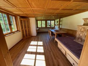 Voodi või voodid majutusasutuse Nagelfluh toas