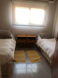 Ένα ή περισσότερα κρεβάτια σε δωμάτιο στο Casa Quebrada y Luna +11 φωτογραφίες