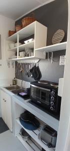 Η κουζίνα ή μικρή κουζίνα στο Heide Cottage +14 φωτογραφίες