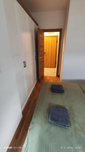 a room with two mats on the floor and a door at Vincent Van Gogh in Podgorica +23 photos