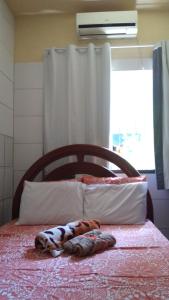 Un pat sau paturi într-o cameră la Beach House