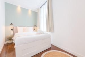 Posteľ alebo postele v izbe v ubytovaní Renovated apartment 3bed 2bath