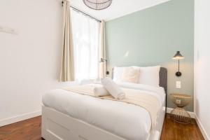 Posteľ alebo postele v izbe v ubytovaní Renovated apartment 3bed 2bath