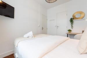 Posteľ alebo postele v izbe v ubytovaní Renovated apartment 3bed 2bath