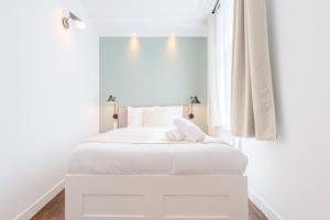 Posteľ alebo postele v izbe v ubytovaní Renovated apartment 3bed 2bath