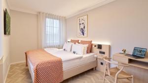 Tempat tidur dalam kamar di Erasmus Smart - Design B&B