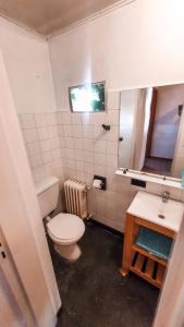 A bathroom at Achalay Houses